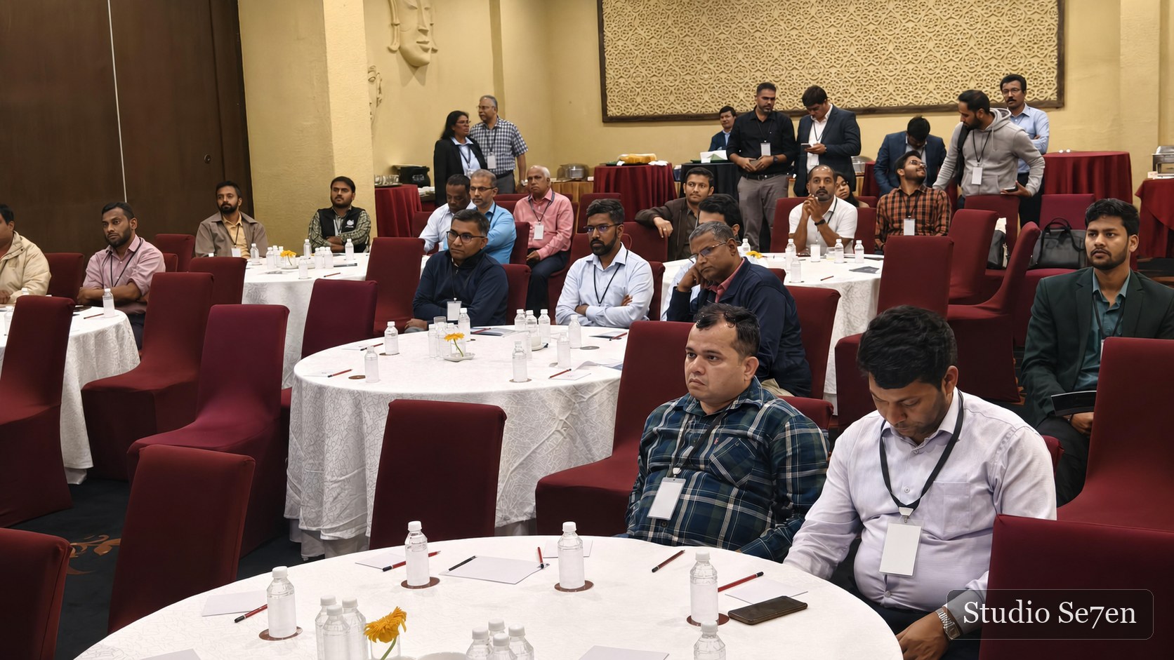 Corporate delegates listening during a professional learning session