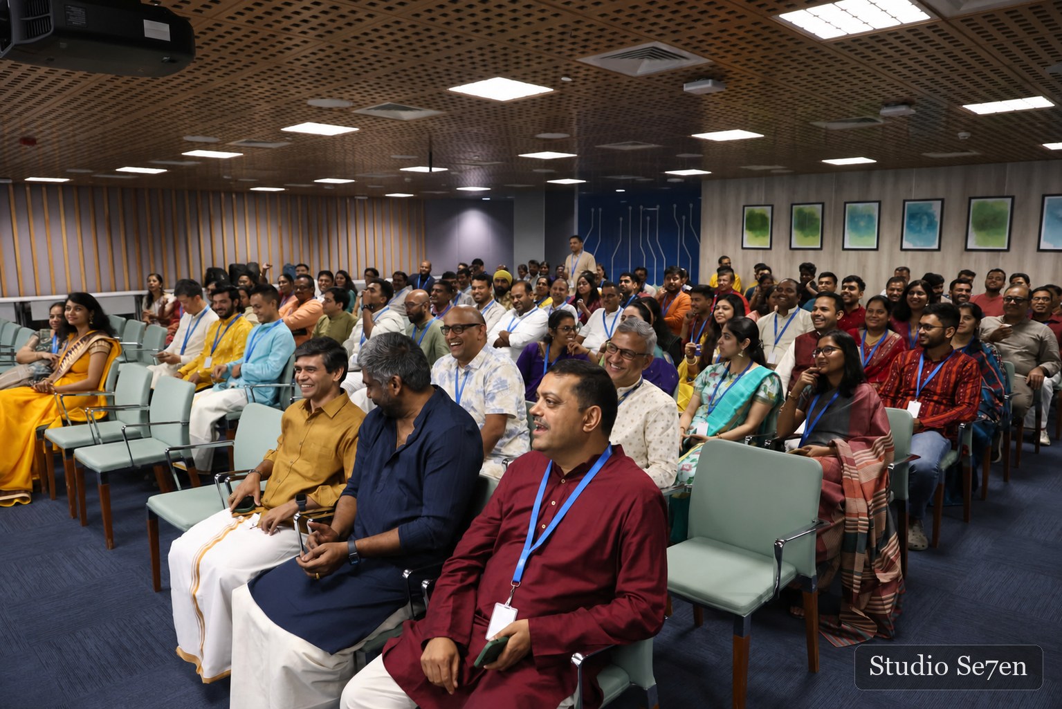 Employees sharing a light moment during a corporate gathering