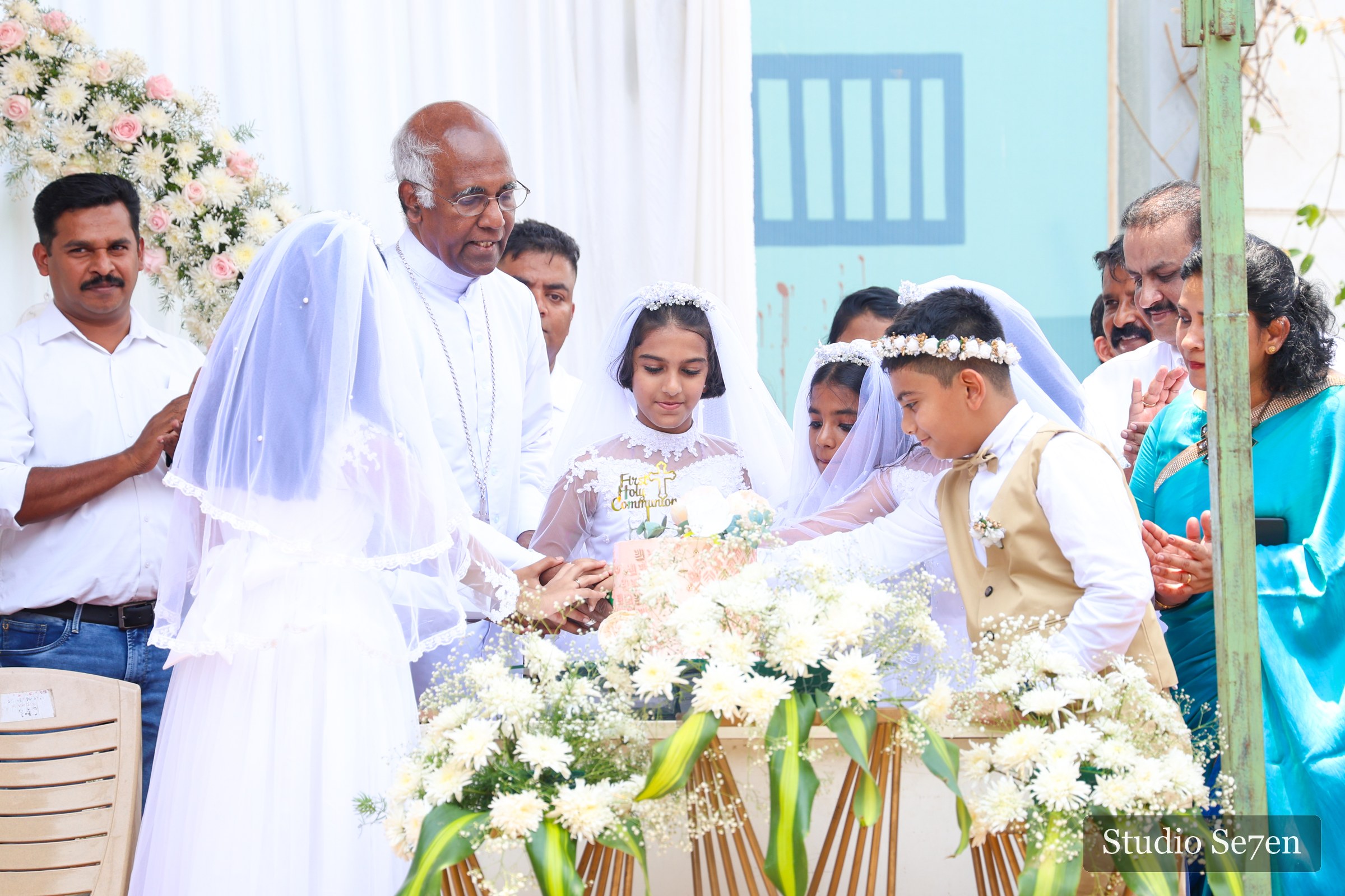 Children taking part in their First Holy Communion ceremony