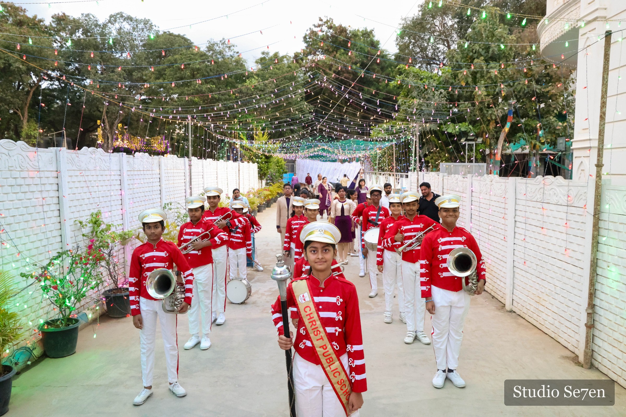 A student marching band assembled before a school annual day