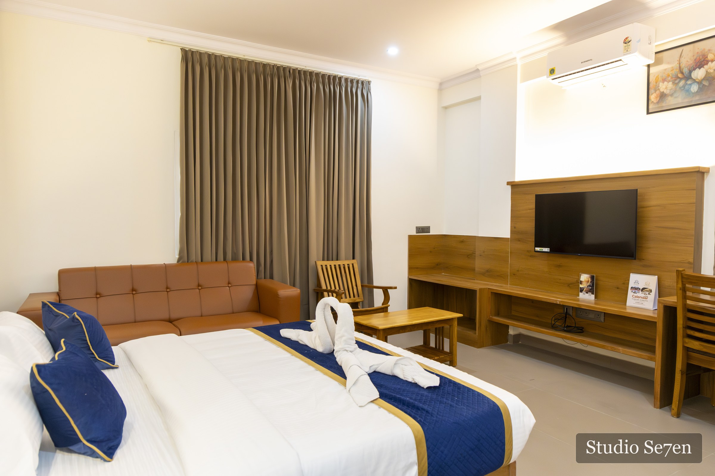 Prepared guest room at The Wilsons with blue and white linen