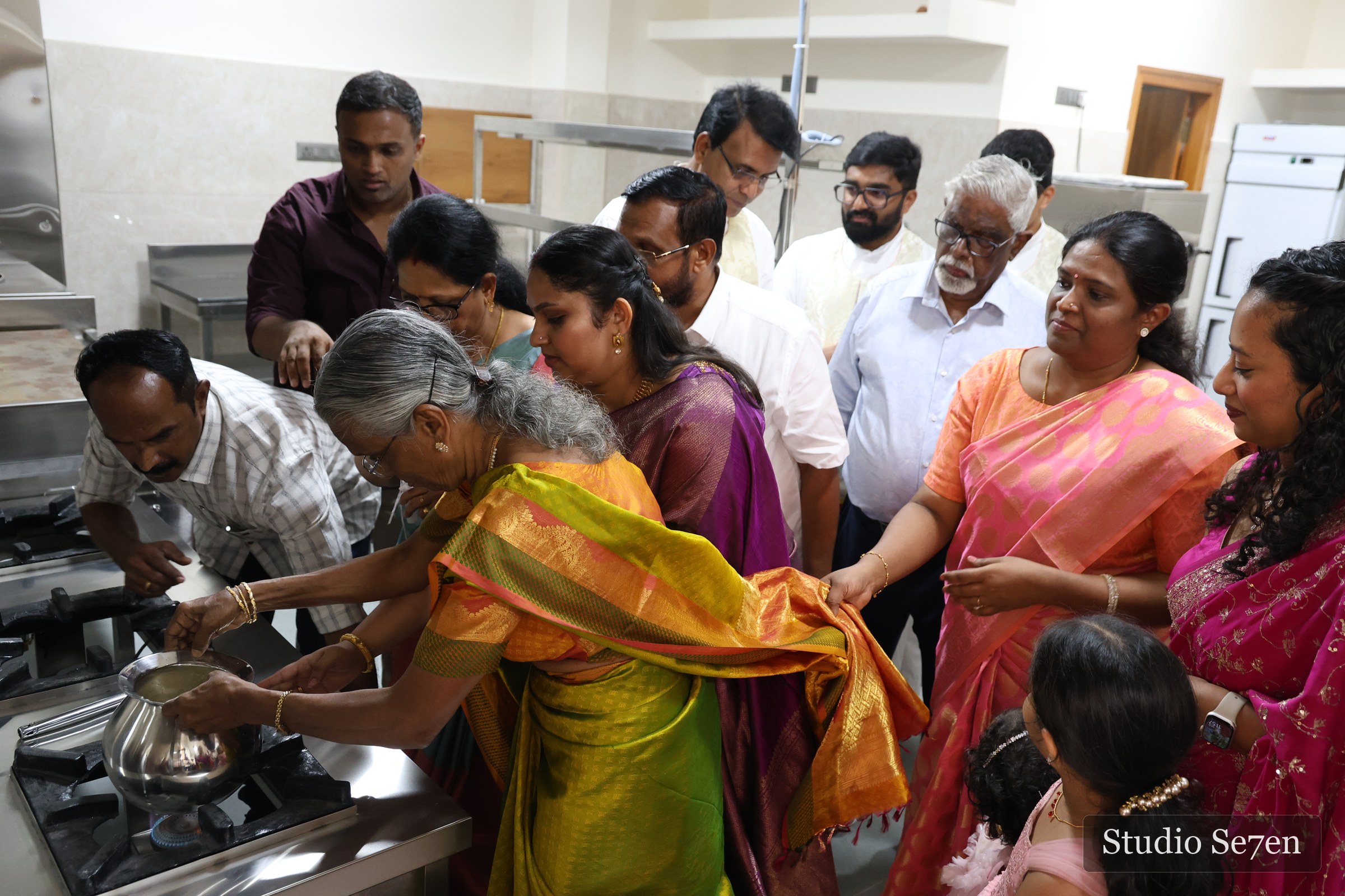 Family members taking part in a ceremonial first cooking at The Wilsons inauguration