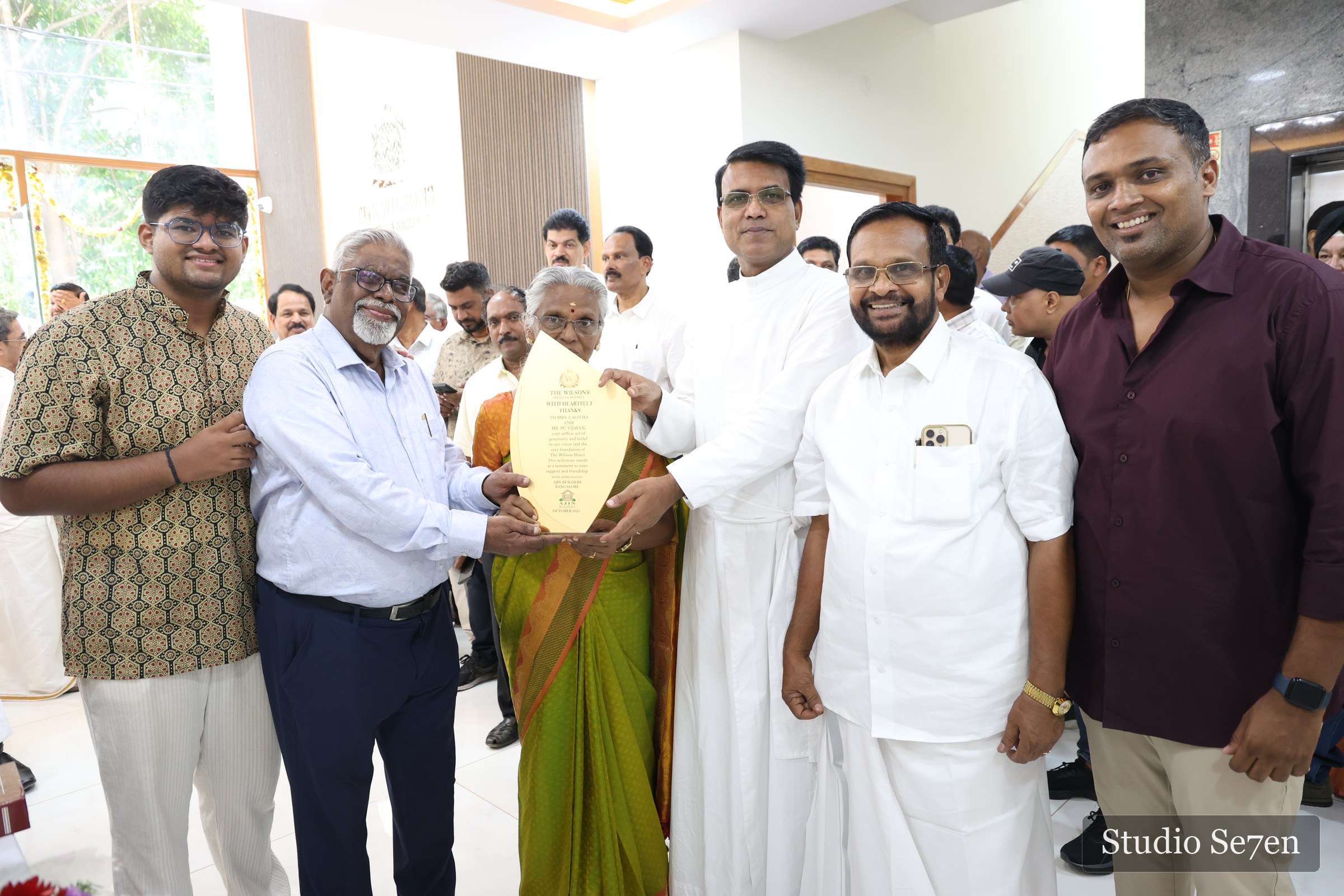 Guests presenting a commemorative memento during The Wilsons inauguration